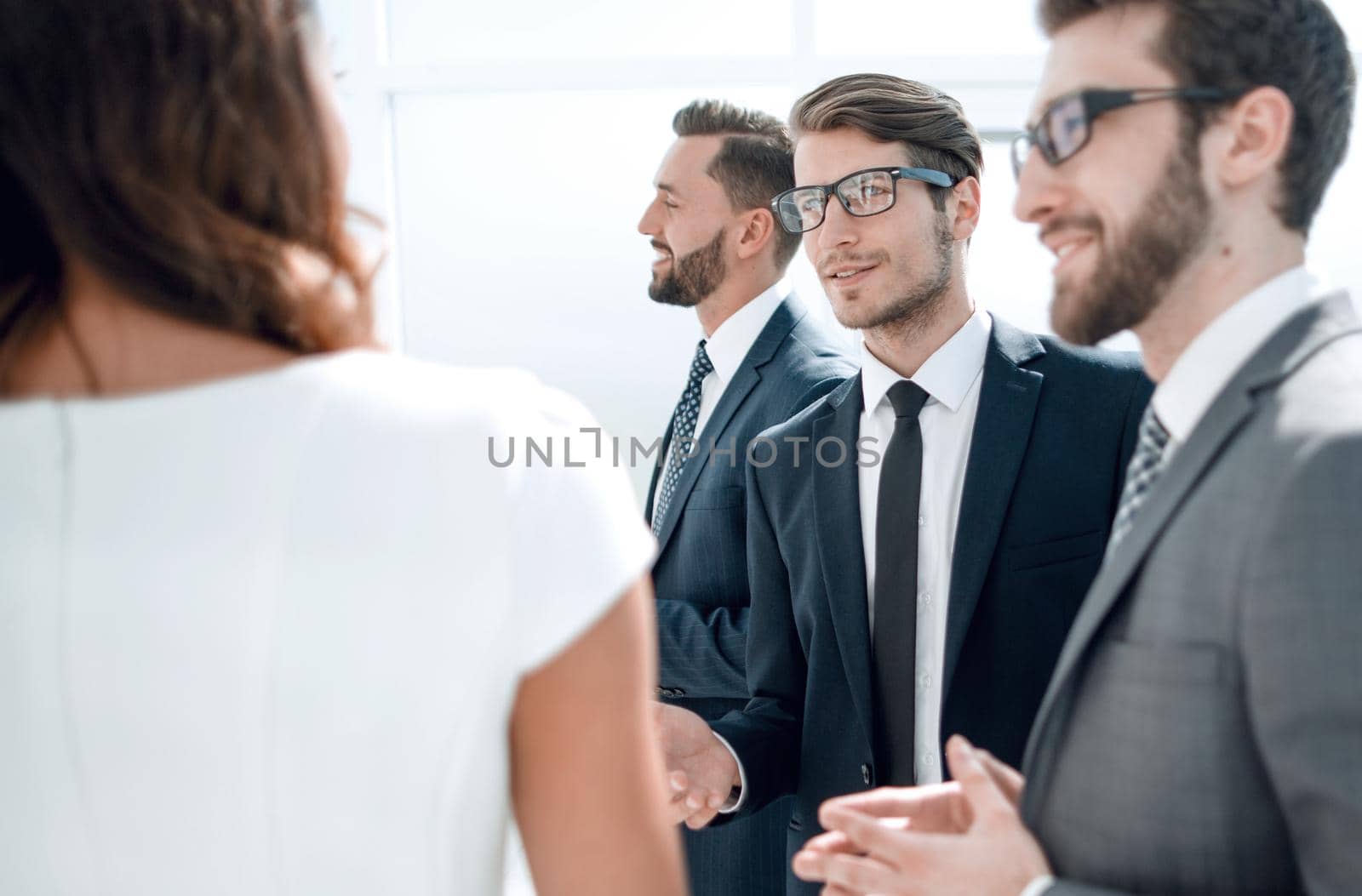 close up.business team standing in the lobby of the office . the concept of teamwork