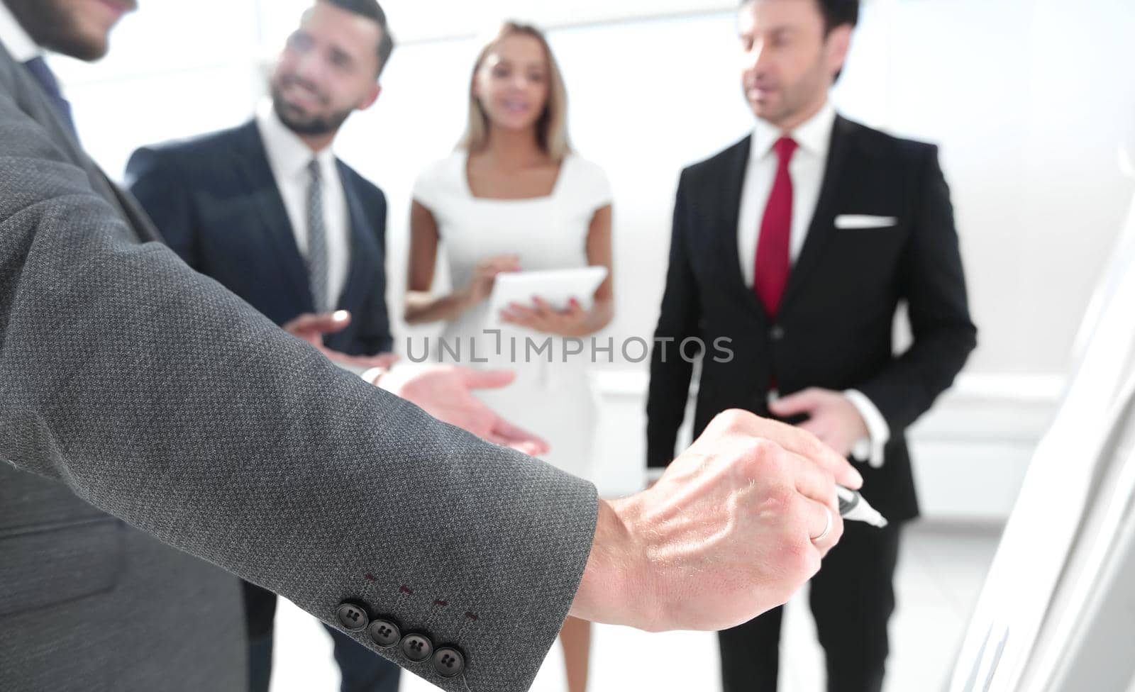 close up.business partners at the presentation of the new project. business concept
