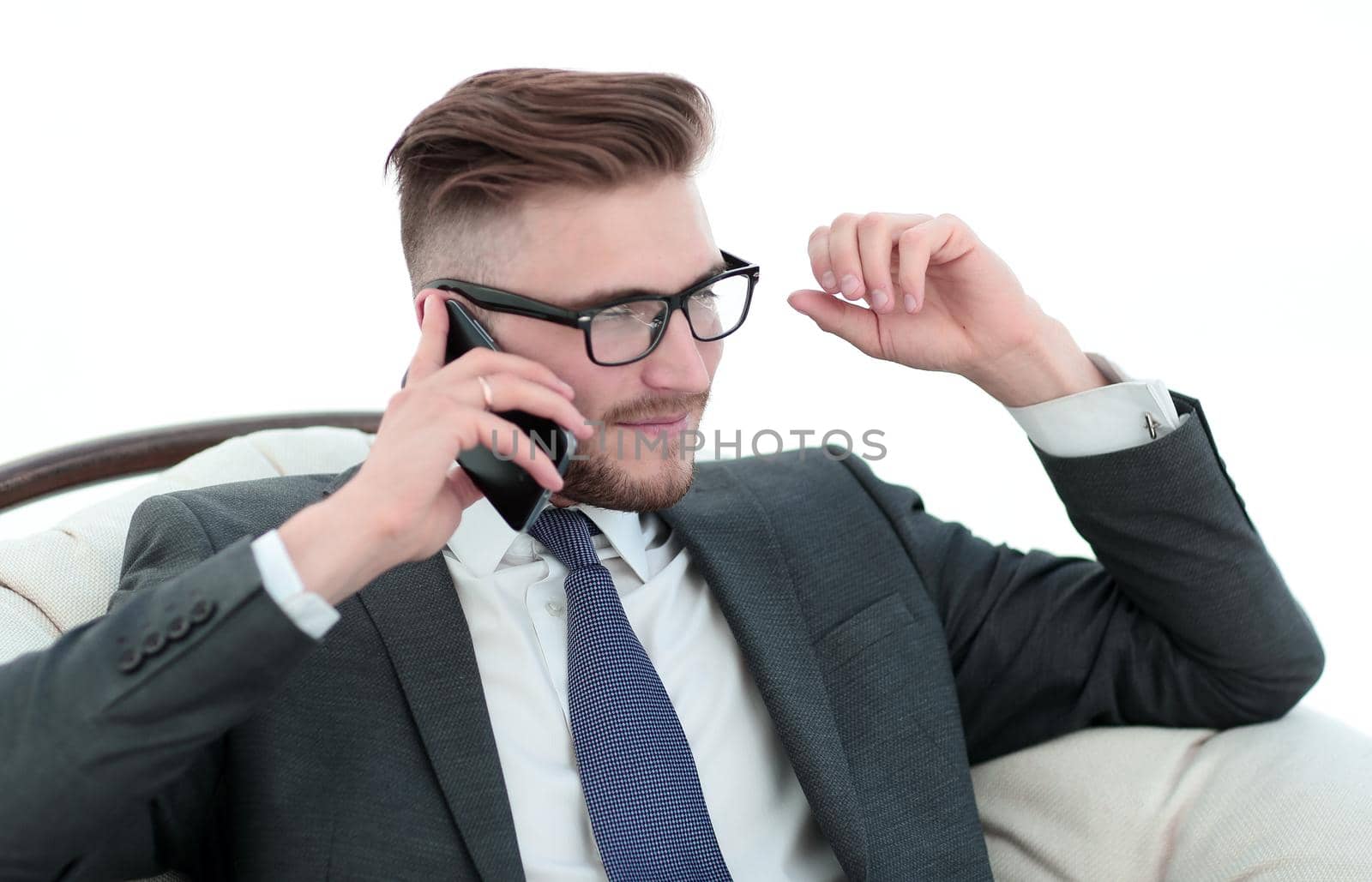 businessman listening to the interlocutor on a mobile phone.photo with text space