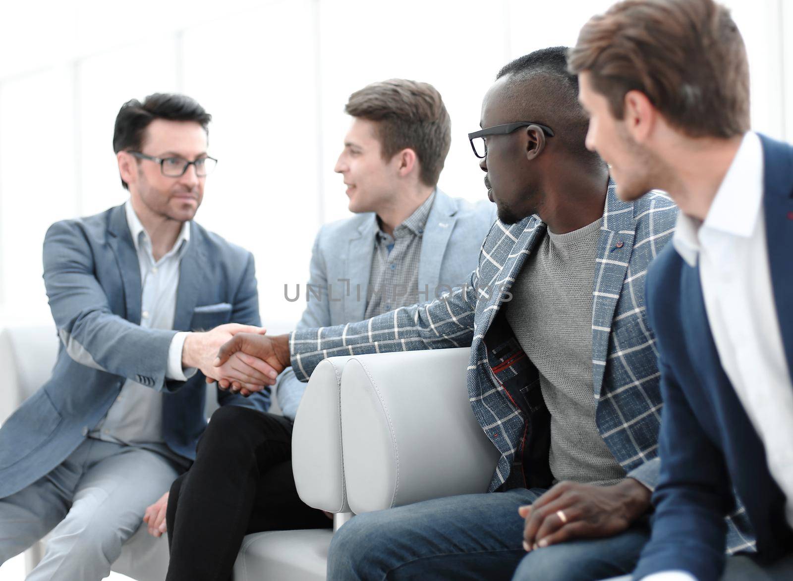 business colleagues reaching out for a handshake.the concept of solidarity