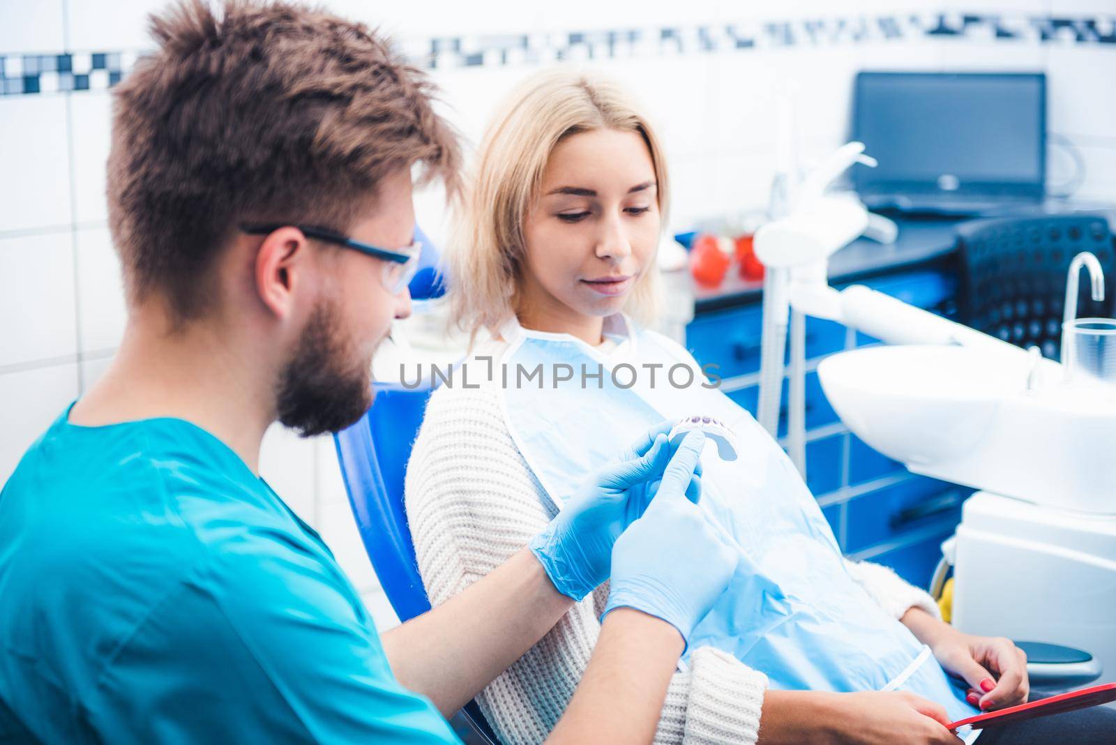 Dentist with teeth model by GekaSkr