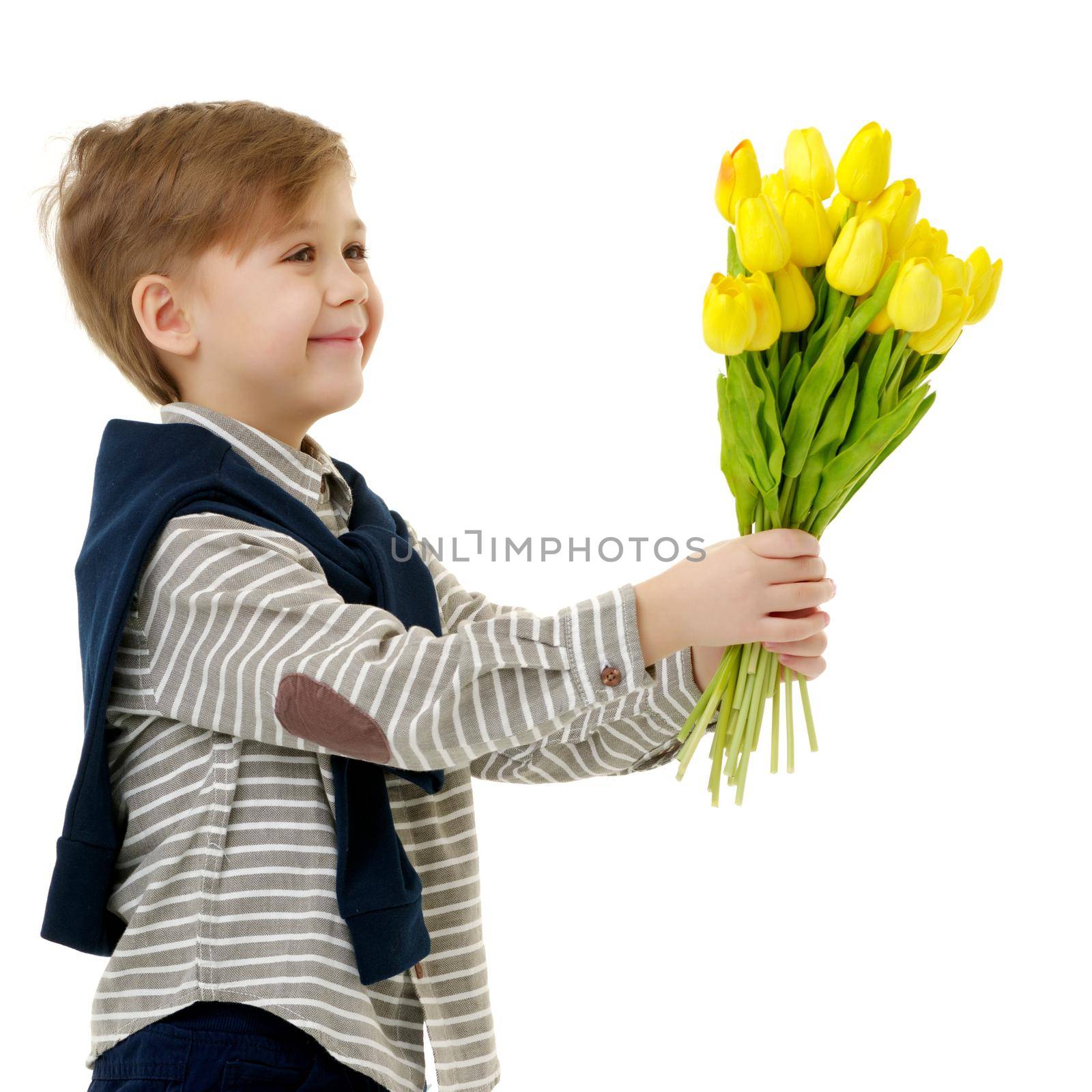 Cute little boy with a bouquet of tulips. Concept spring, holiday, gift. Isolated on white background.