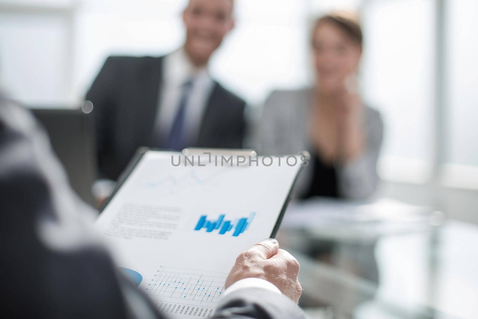 background image of a businessman checking financial documents.business background