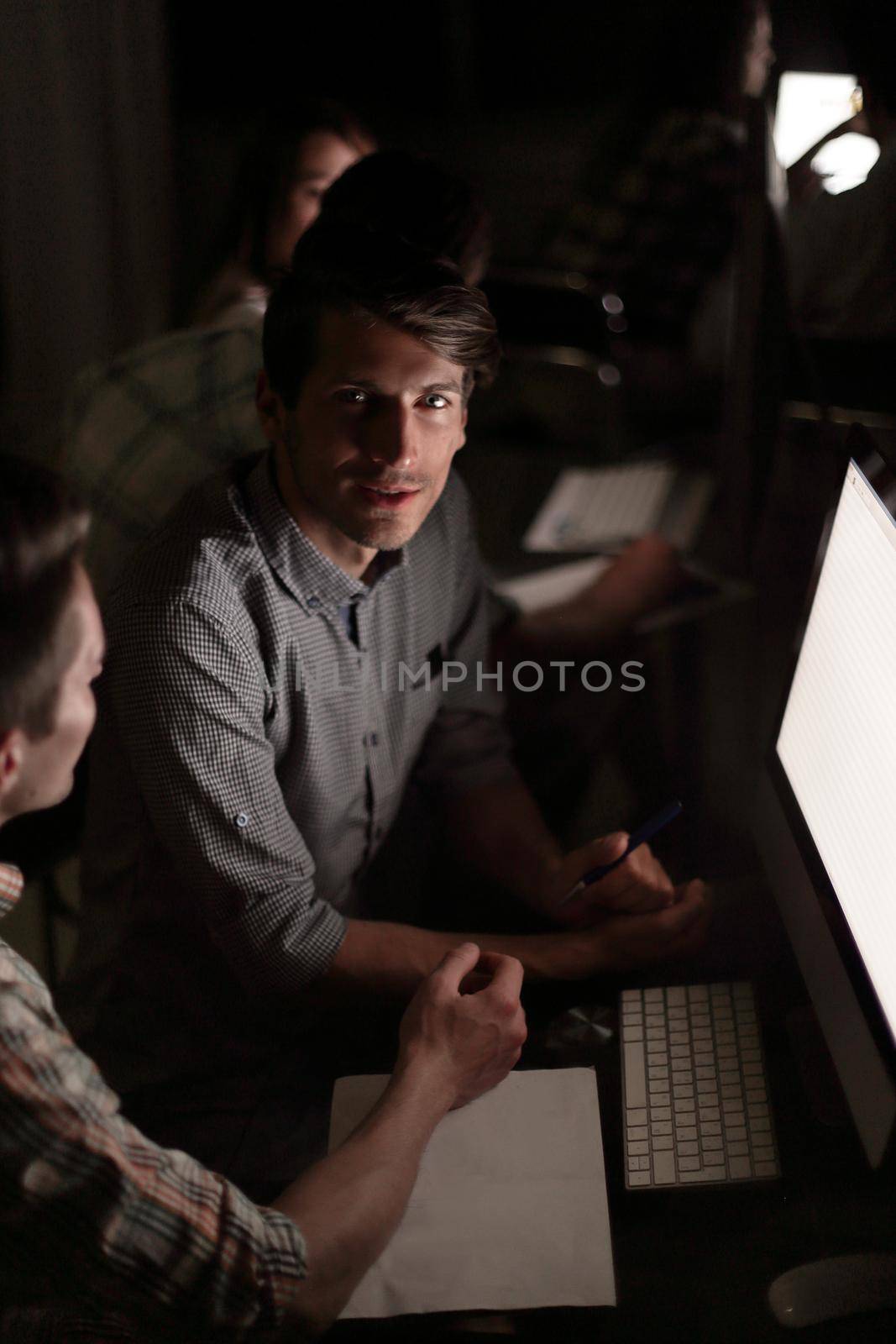 close up.employees of the company are discussing new information. business concept