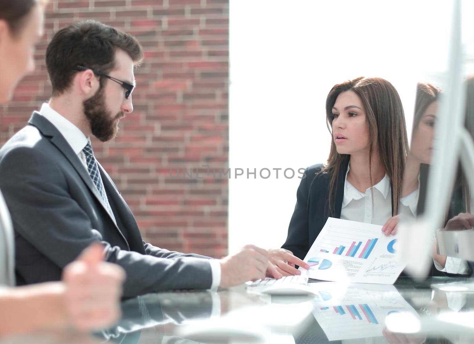 business team looks out the office window .photo with copy space