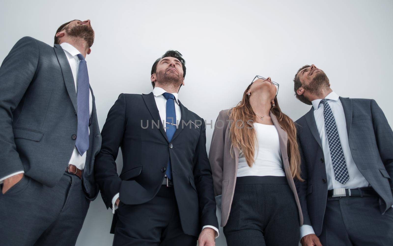 business team looking up in the office, bottom view