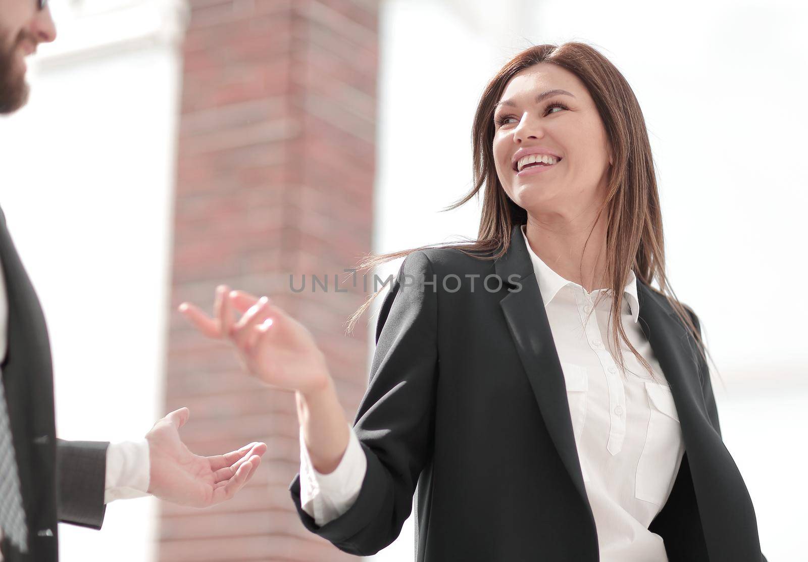 successful business woman talking to a colleague.photo with copy space