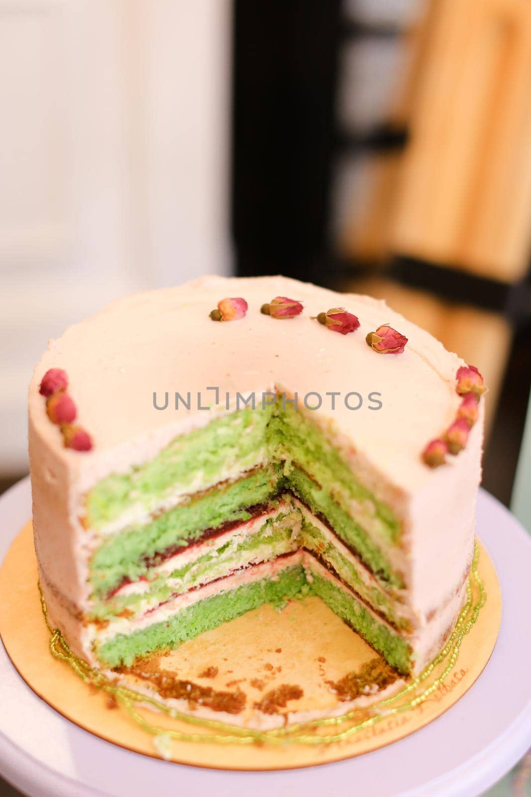 Delicious green multicolored cake. Concept of sweet food for birthday party.