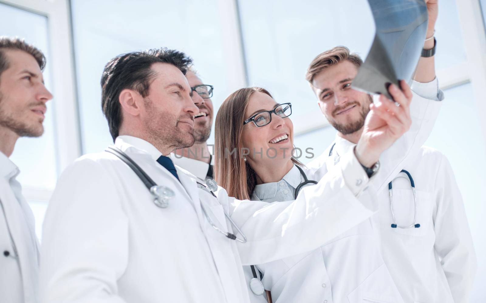 group of doctors discussing the x-ray. the concept of teamwork