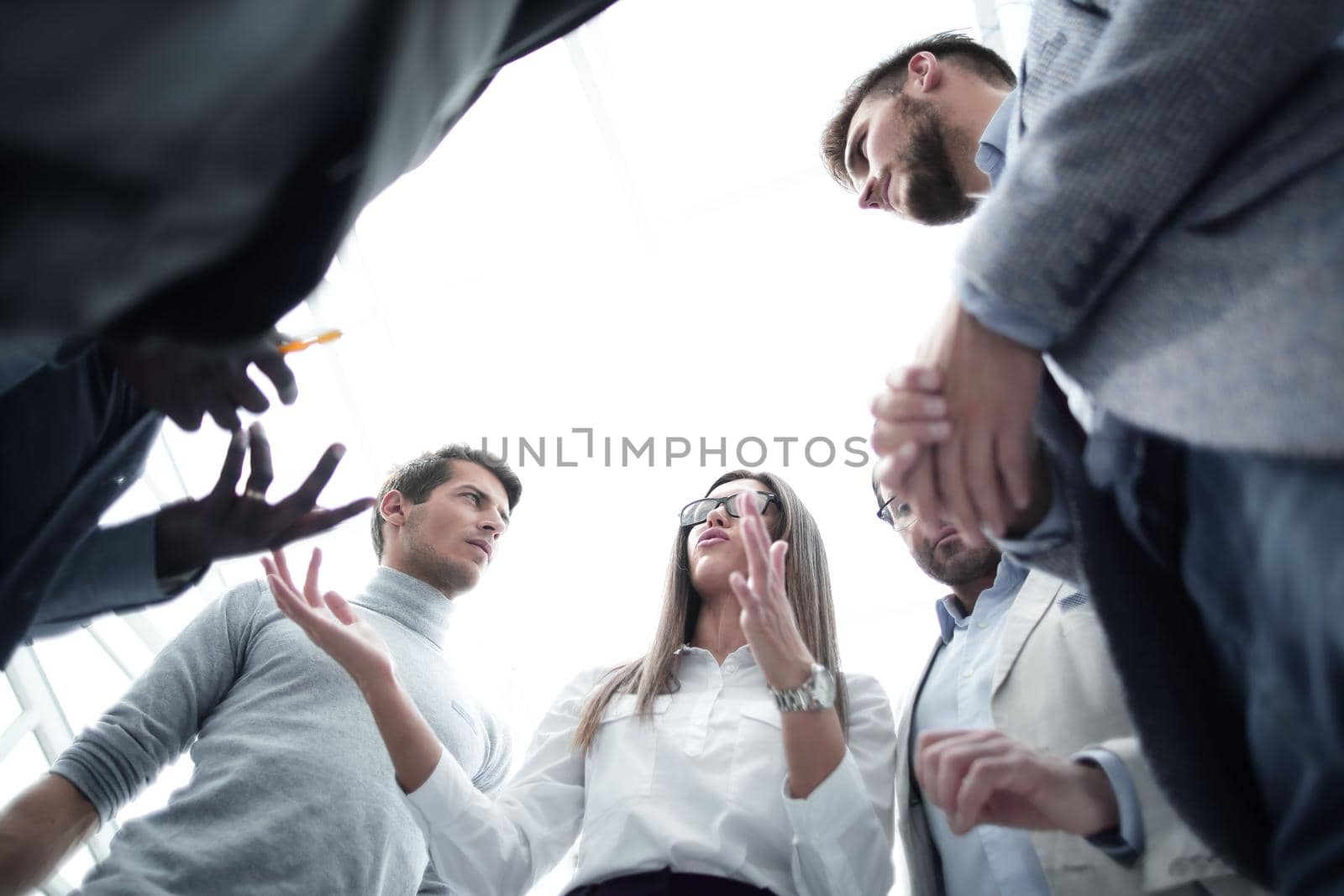 bottom view.business woman discusses with the business team new ideas.photo with copy space