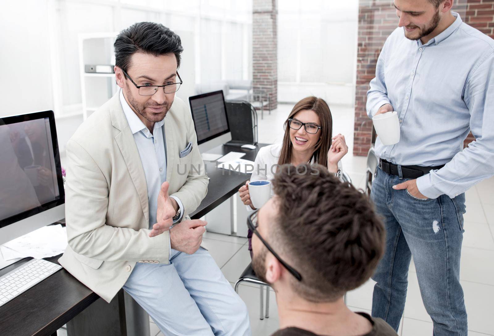 modern business team during coffee break. the concept of teamwork