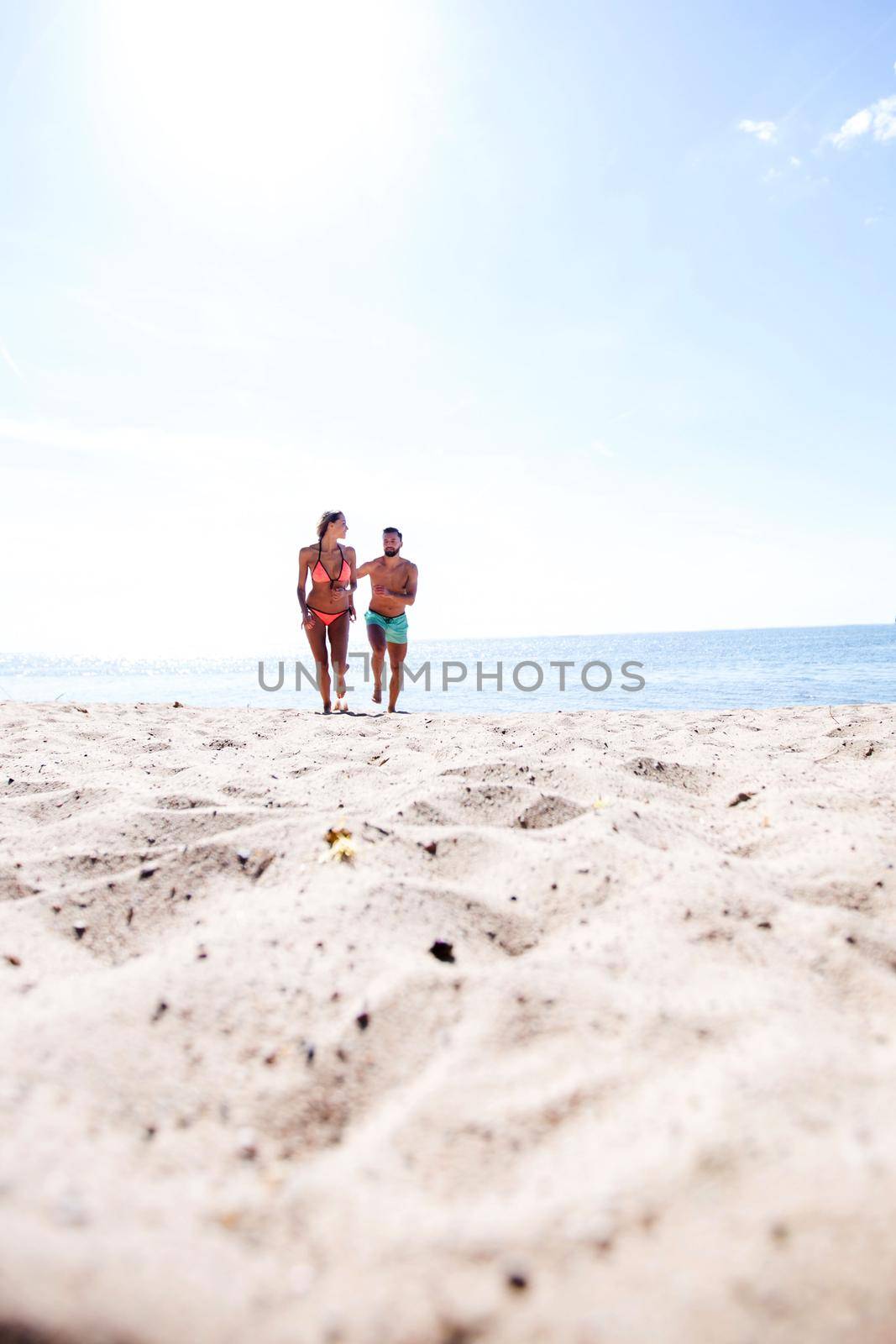 Happy Couple Running on Tropical Beach at Sunset, Vacation