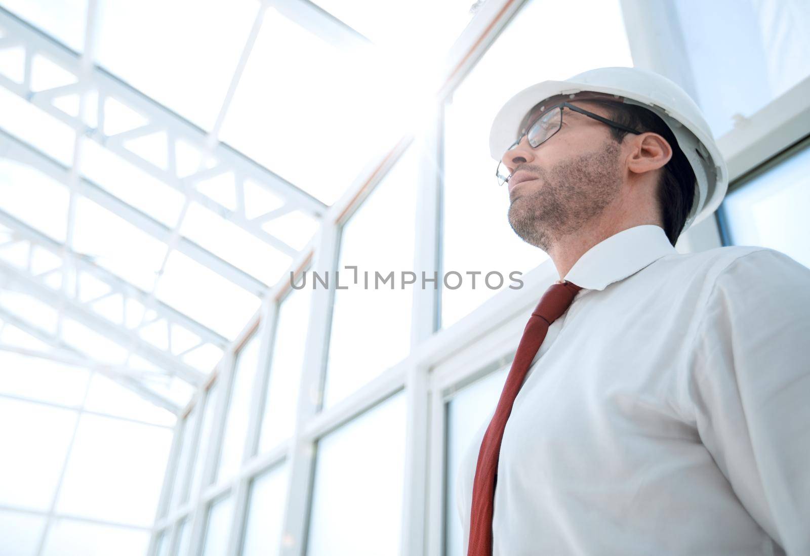 architect designer looking in an empty office.photo with copy space