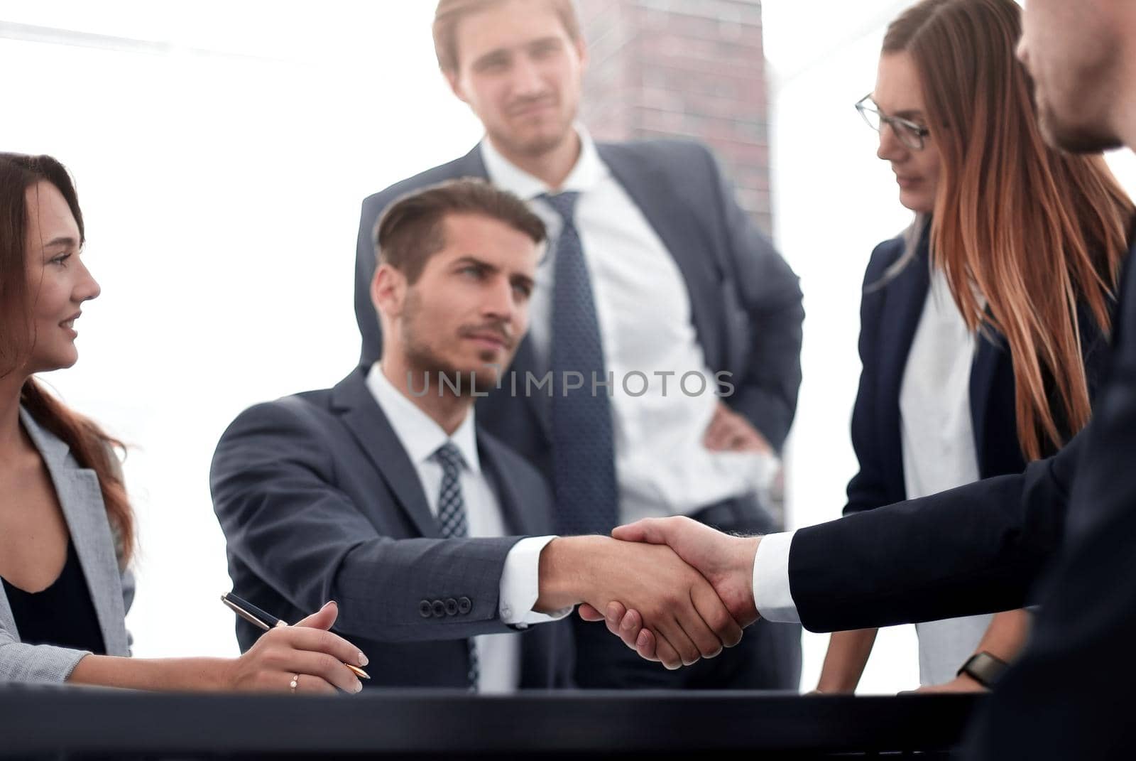 Business colleagues sitting at a table during a meeting