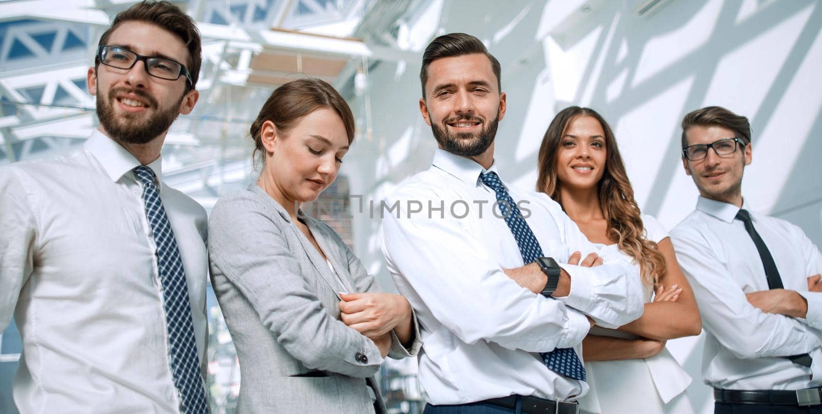 professional business team on the background of a modern office. the concept of teamwork