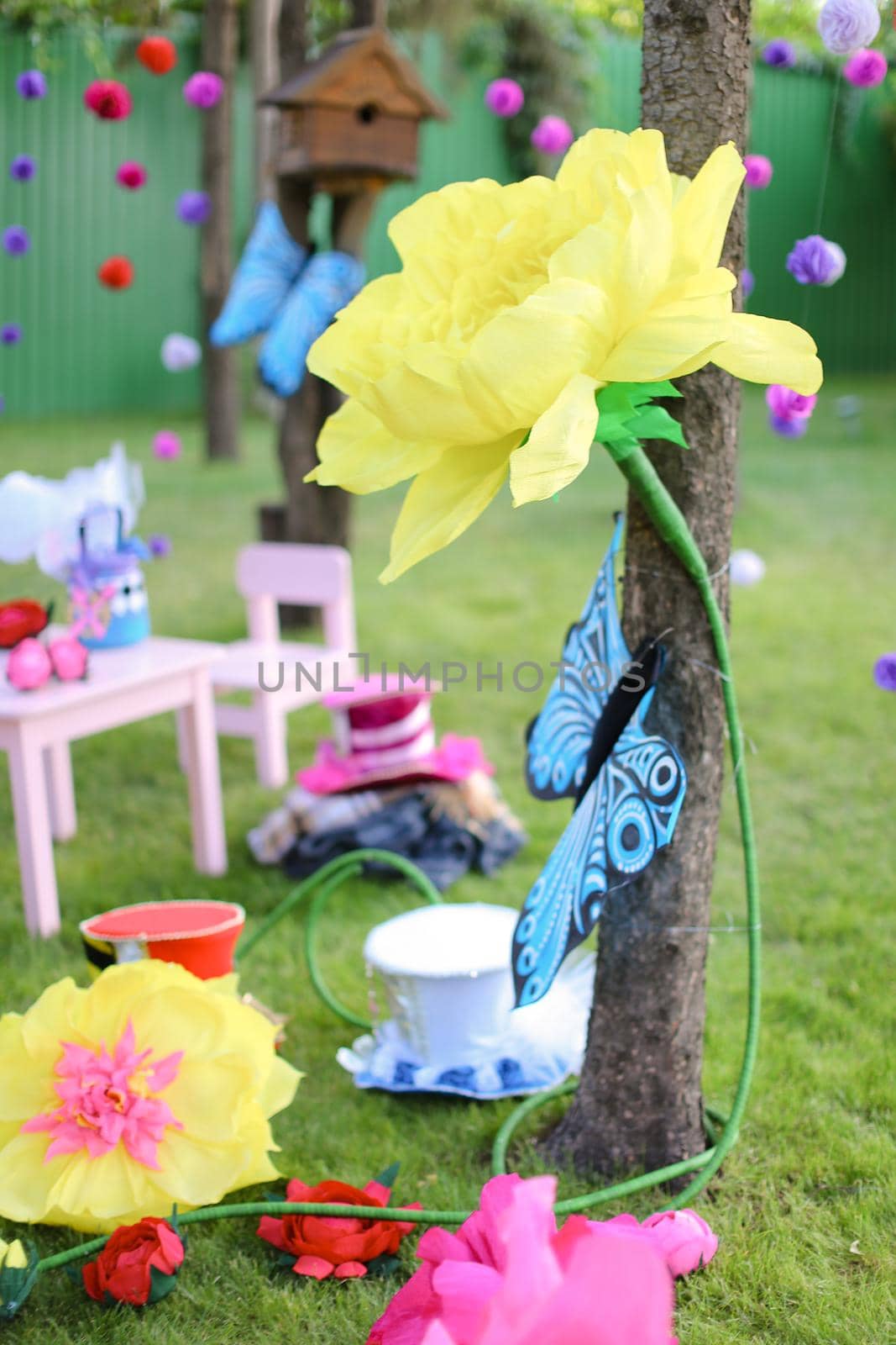 Yellow flower and different bright decorations in summer camp.