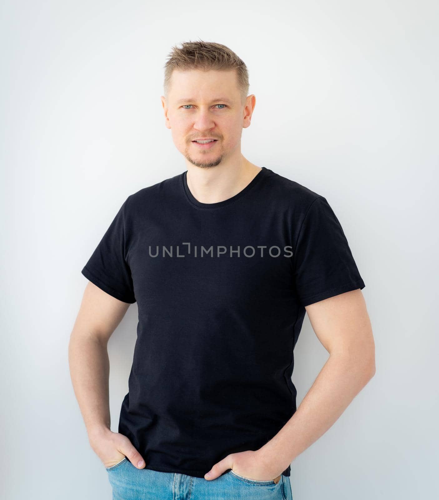 Happy man wearing black shirt with copy space