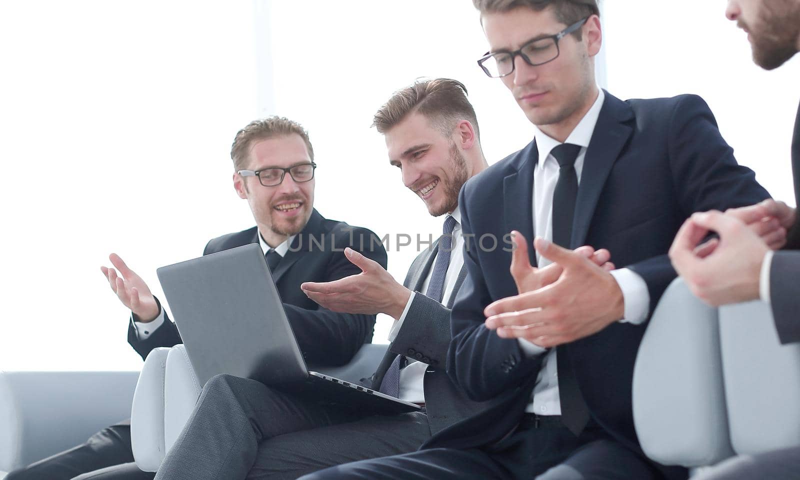 group of business people talking sitting in the office waiting room .business concept