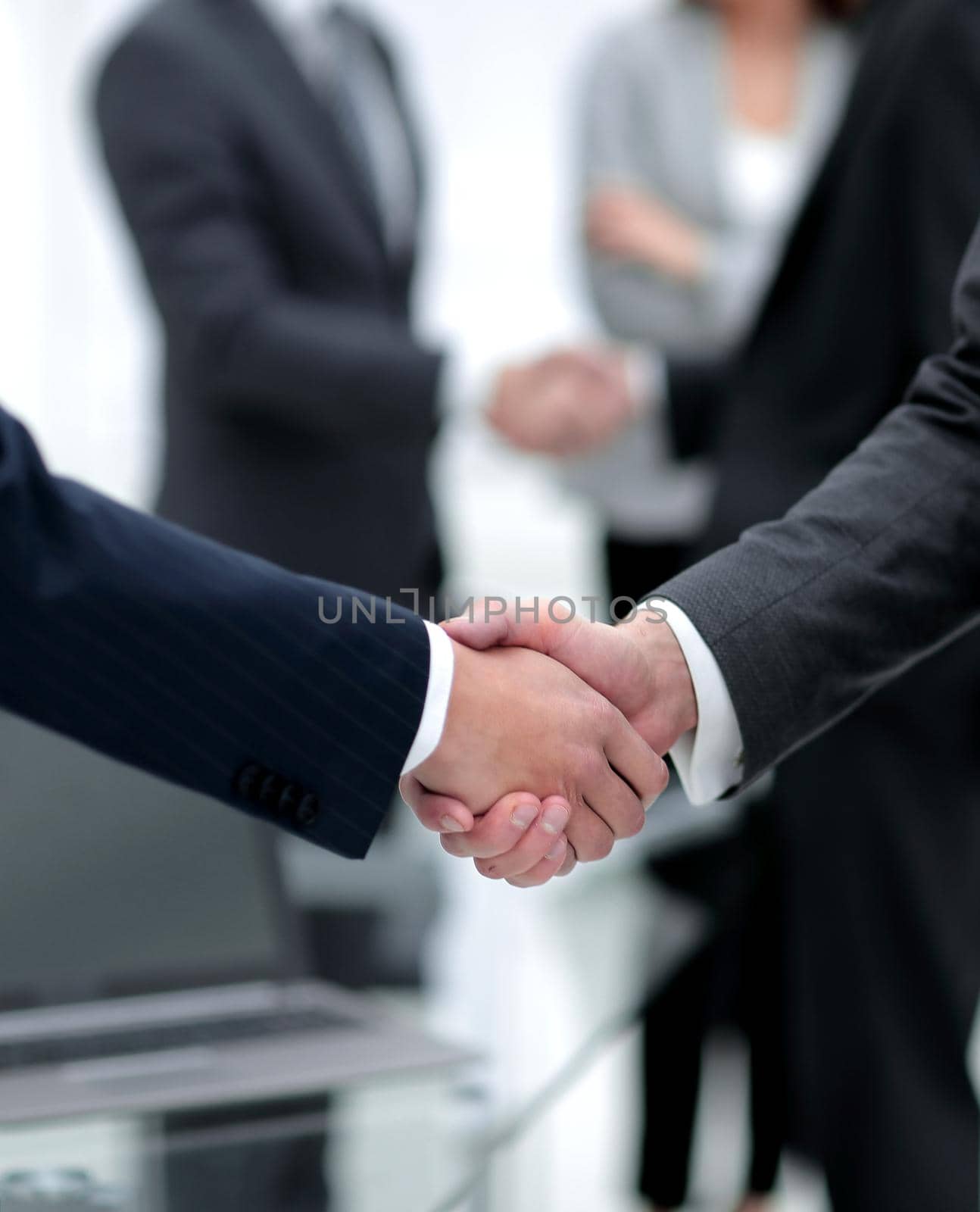 concept of cooperation.handshake of business partners.