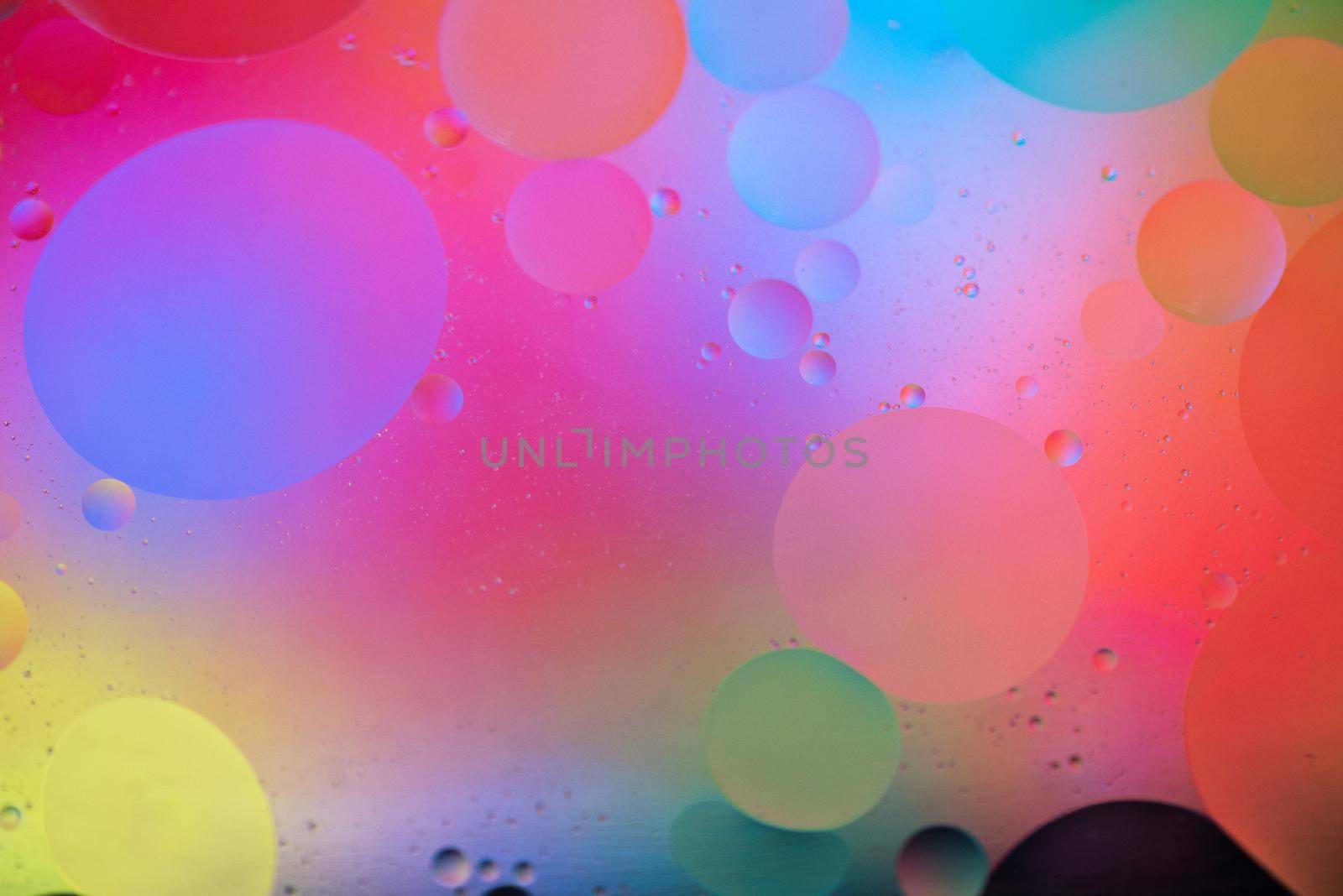 Rainbow abstract background picture made with oil, water and soap by anytka