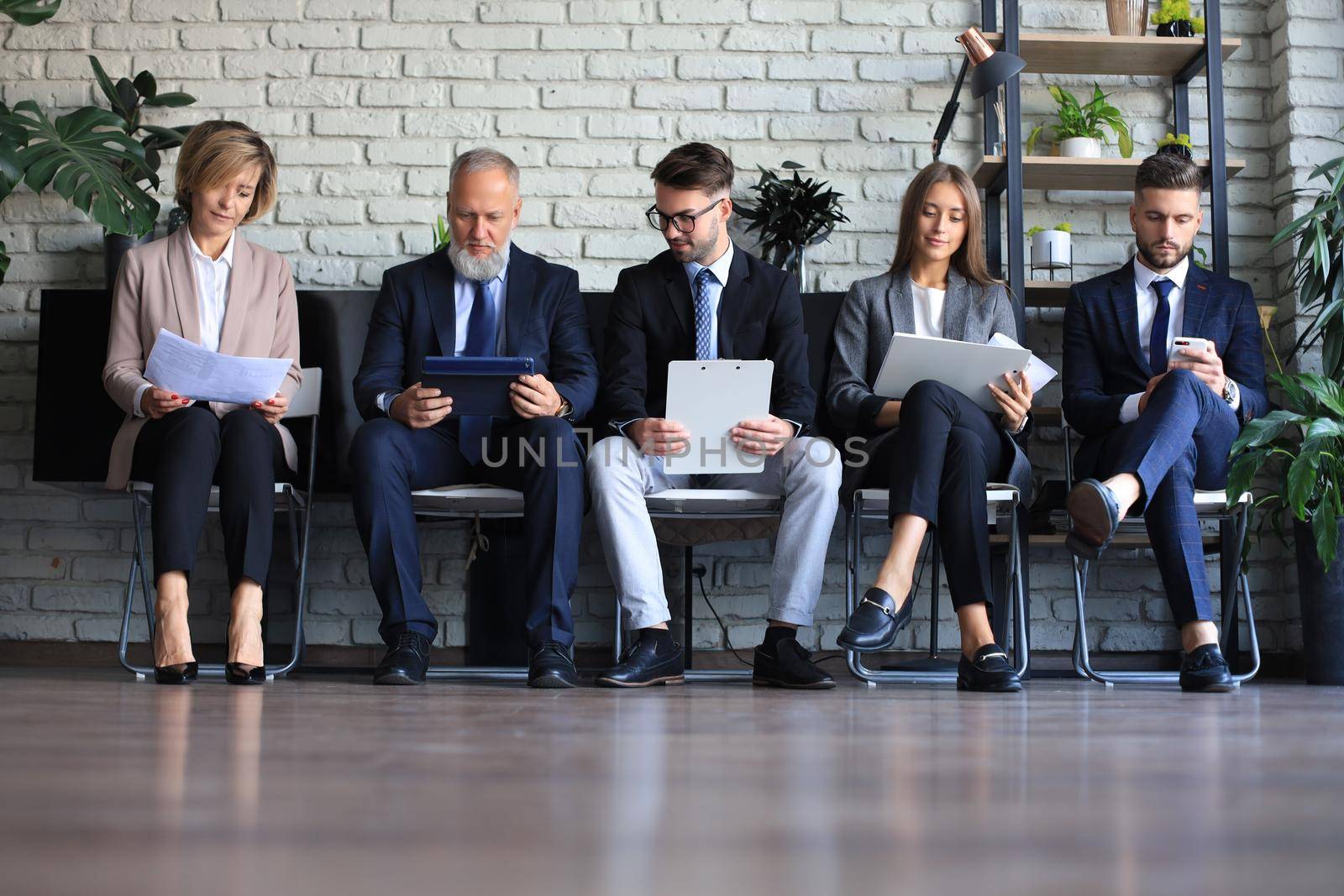 Modern business people waiting for job interview