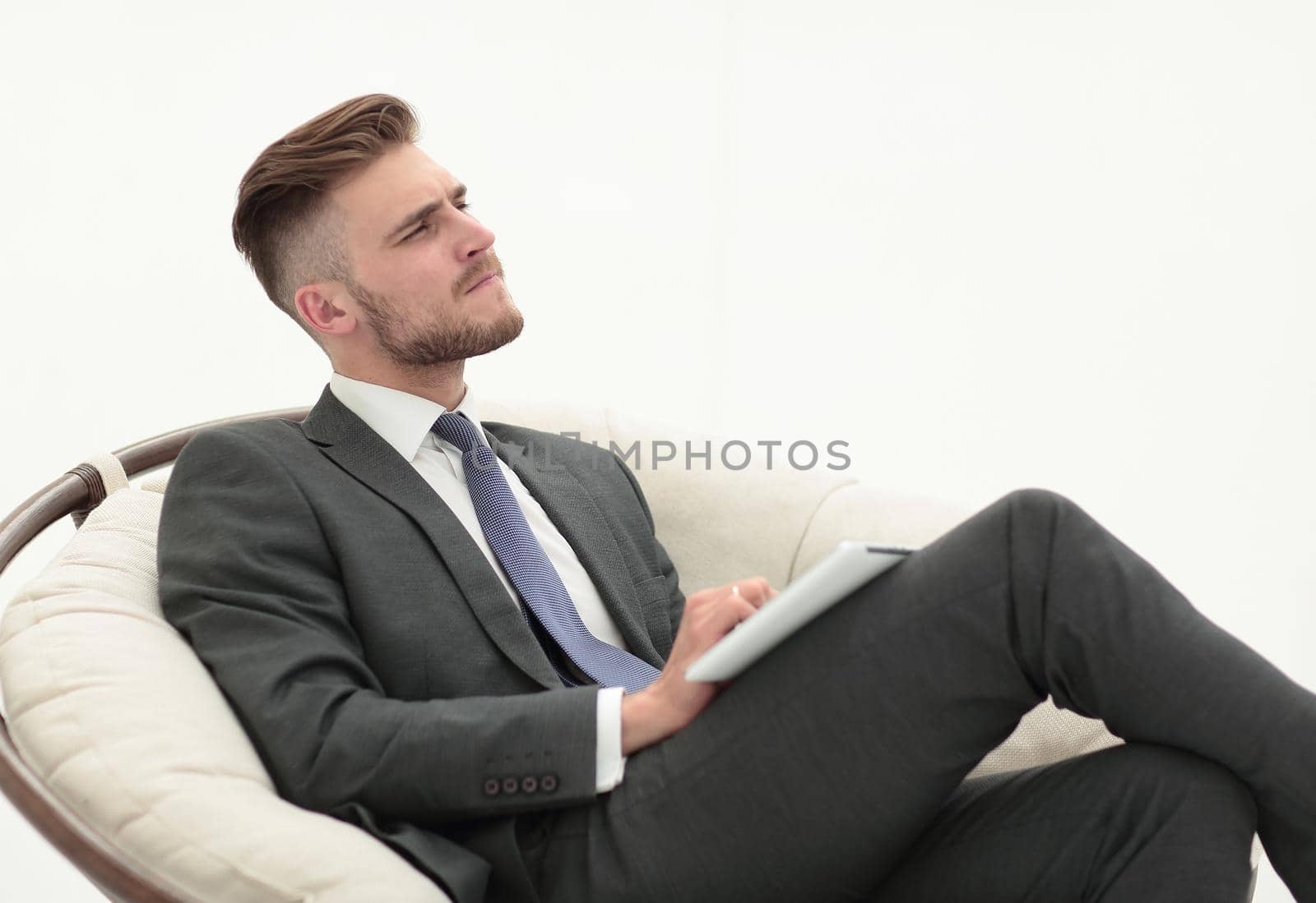 thoughtful business man with digital tablet.photo with text space