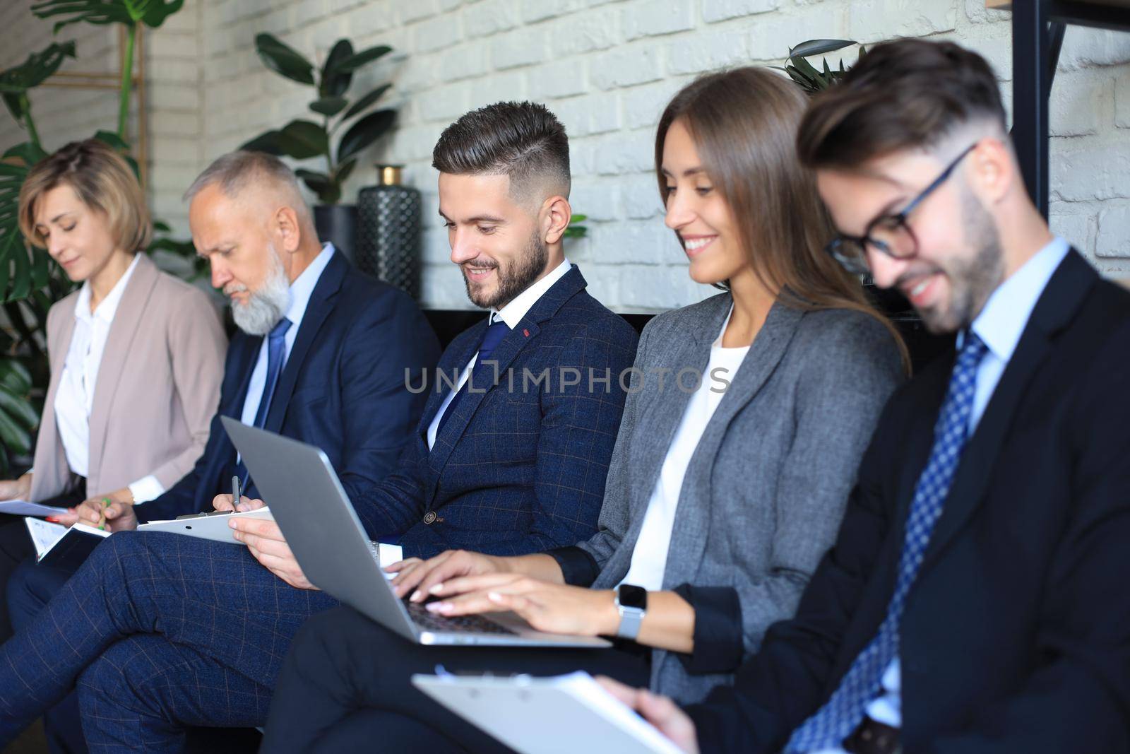 Modern business people waiting for job interview