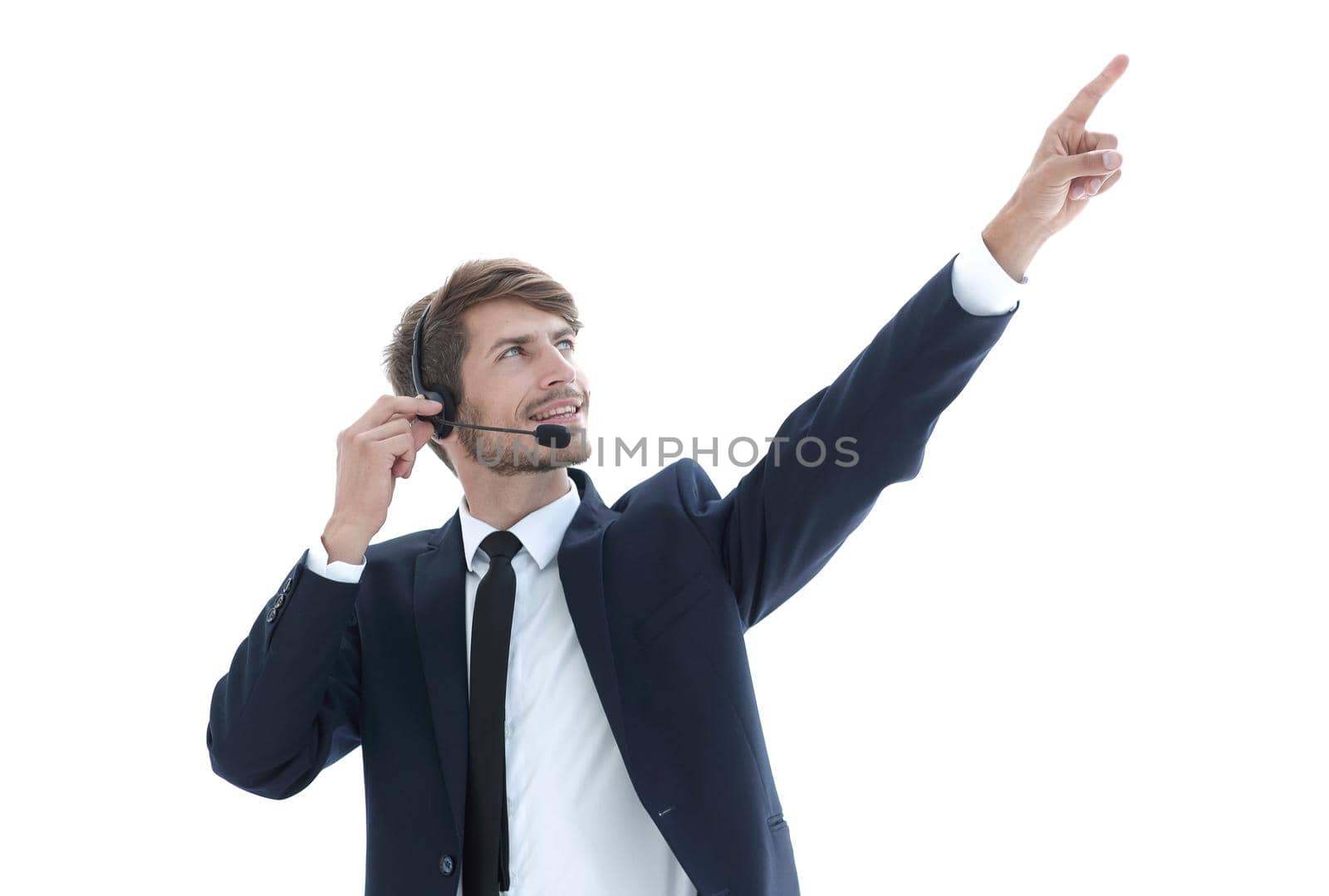 successful businessman with headphones showing his finger on the camera.selects you.