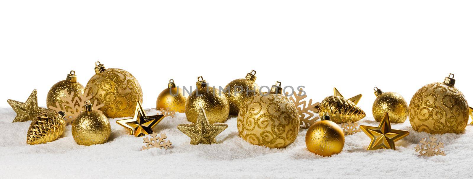 Christmas golden baubles on snow by Yellowj