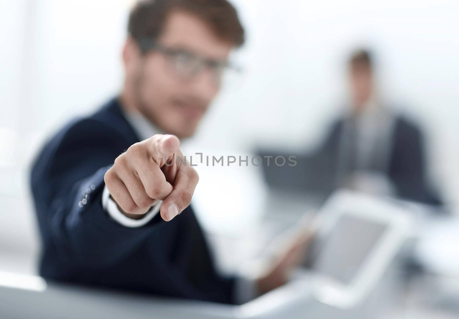 businessman pointing his finger at the camera by asdf