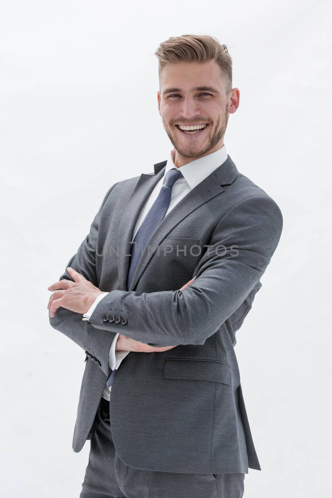 close up.portrait of a confident young businessman.isolated on white