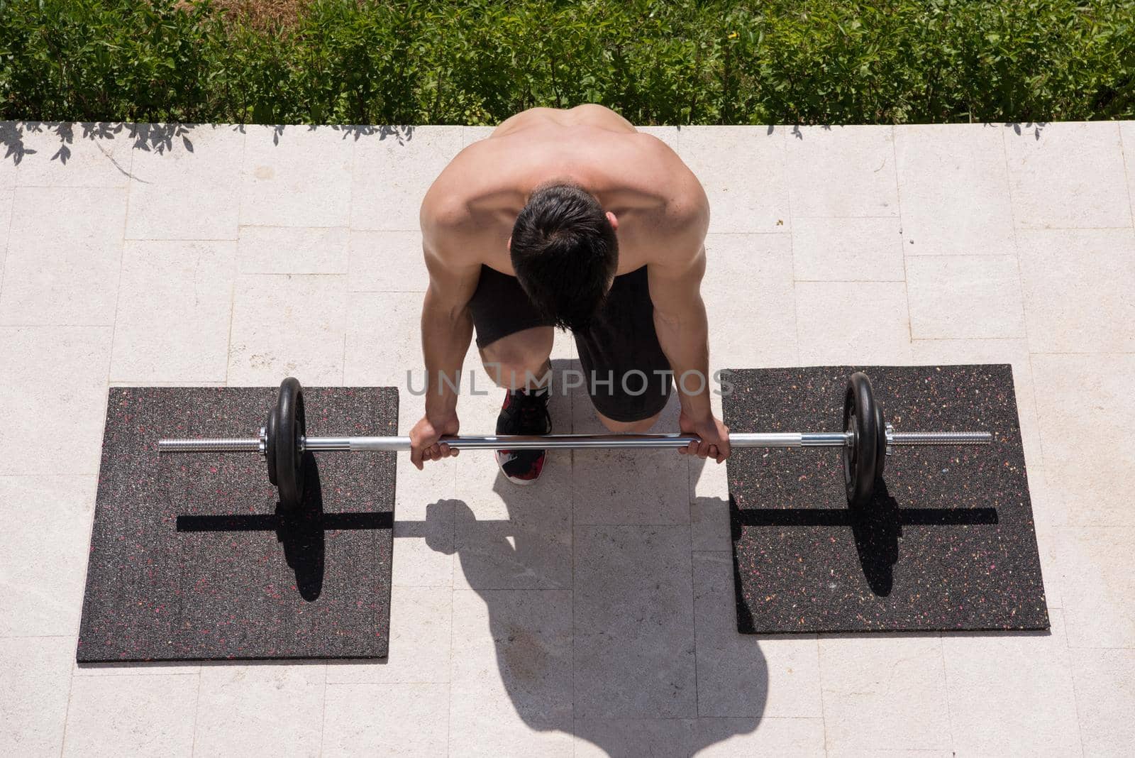 man doing morning exercises by dotshock