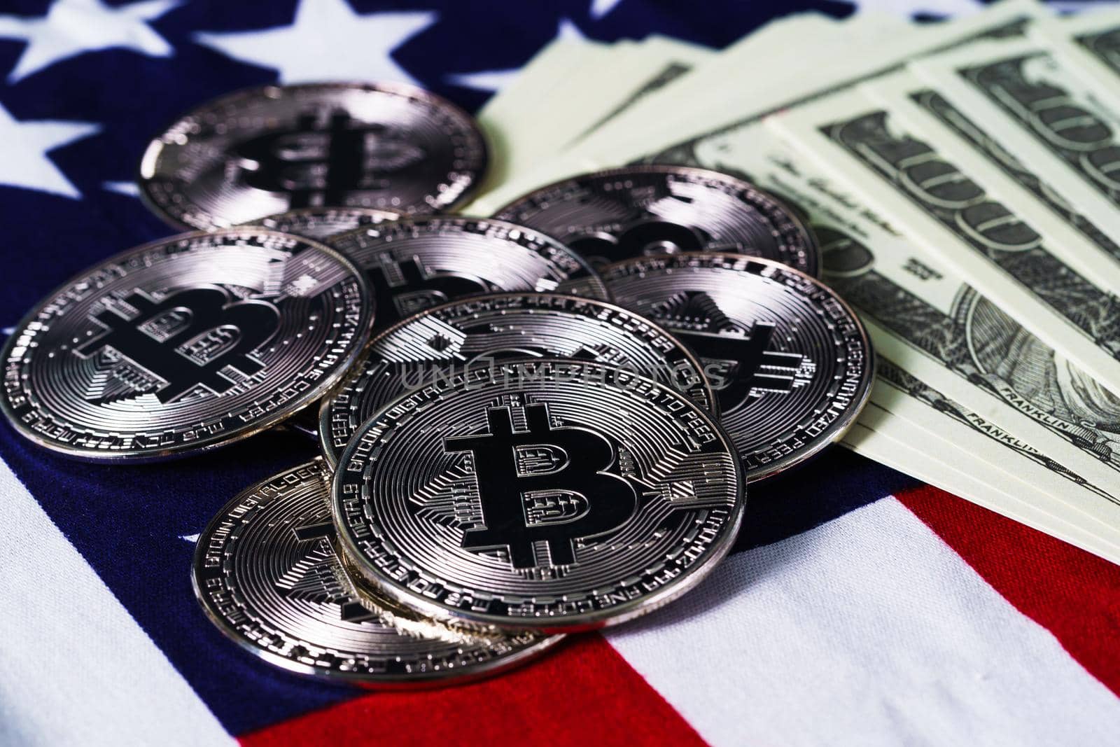 Bitcoin coins and banknote on usa flag  by stoonn