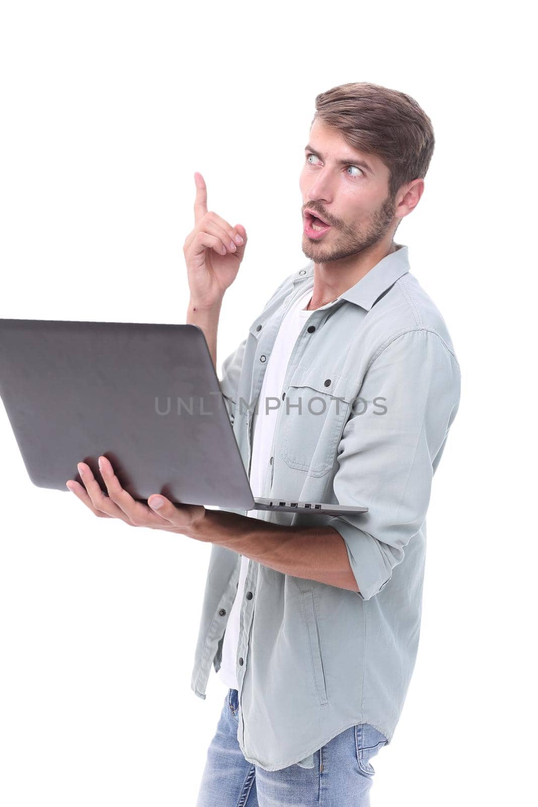 close up. brooding guy with a laptop .isolated on white background