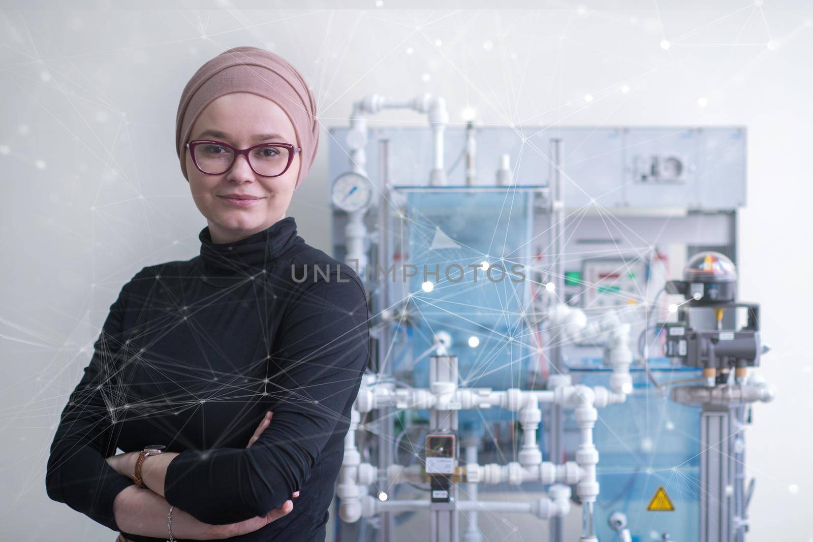portrait of a young female muslim student standing in the electronic classroom, Education and technology concept