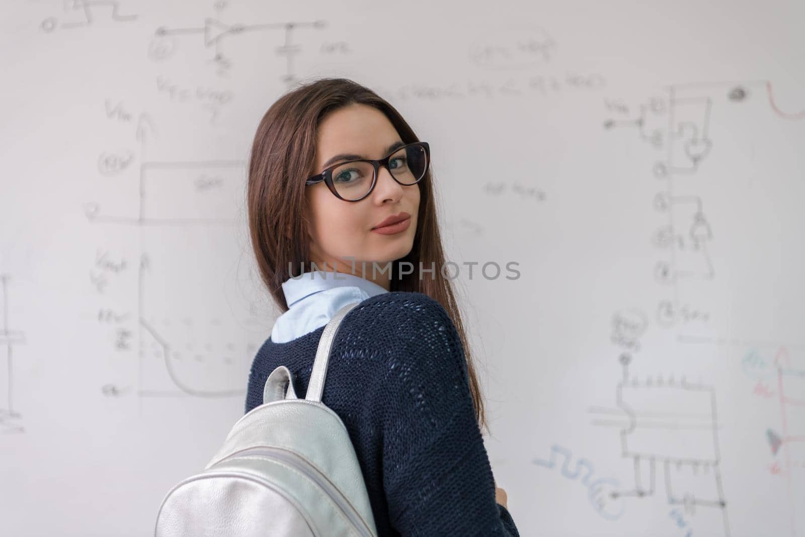portrait of a young beautiful female student by dotshock