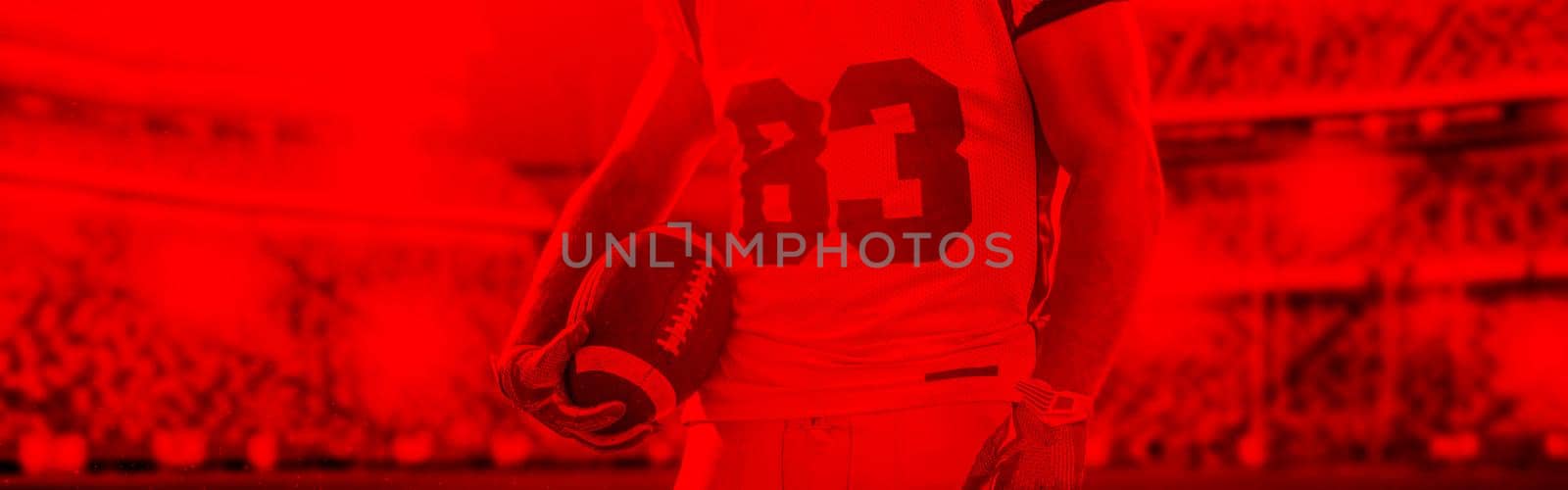 duo toned american football player in  arena at night with stadium lights