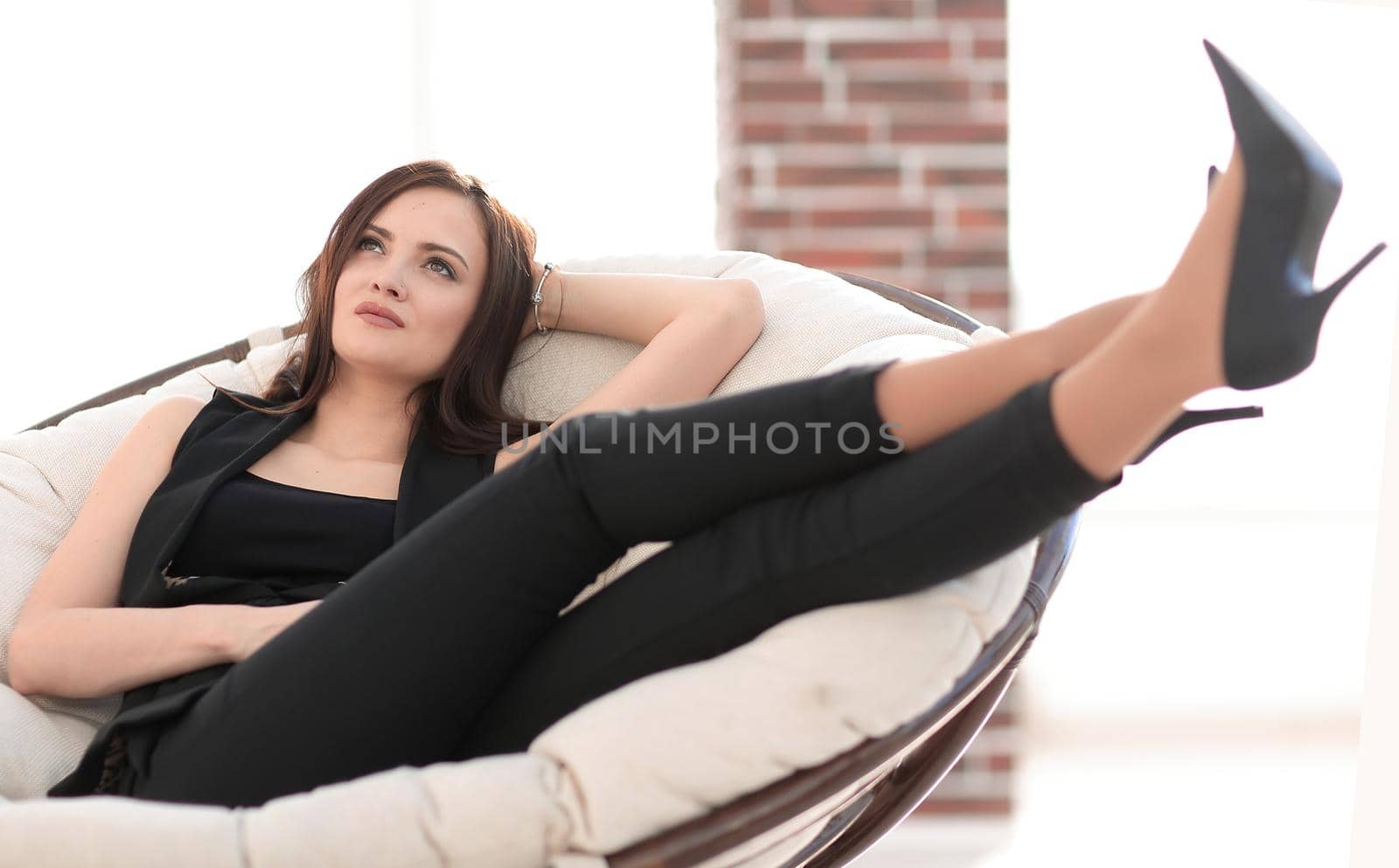 elegant business woman sitting in a comfortable chair.photo with copy space