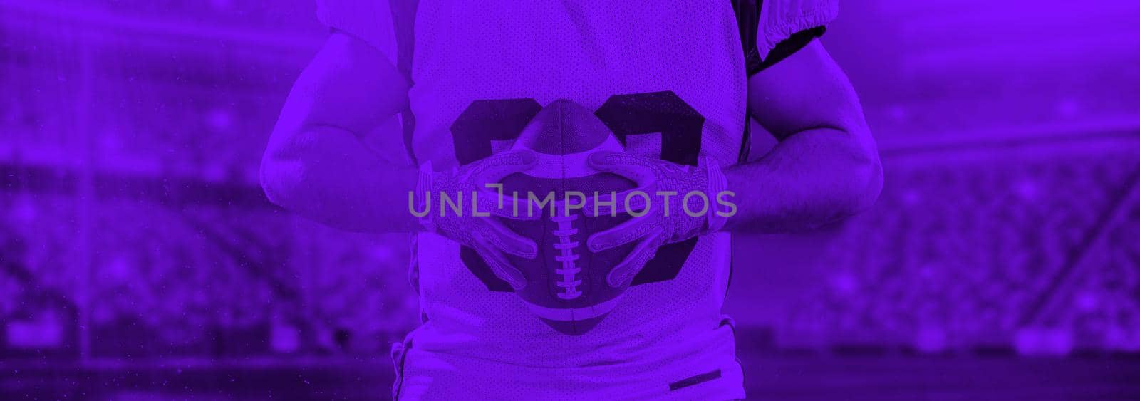 duo toned american football player in  arena at night with stadium lights