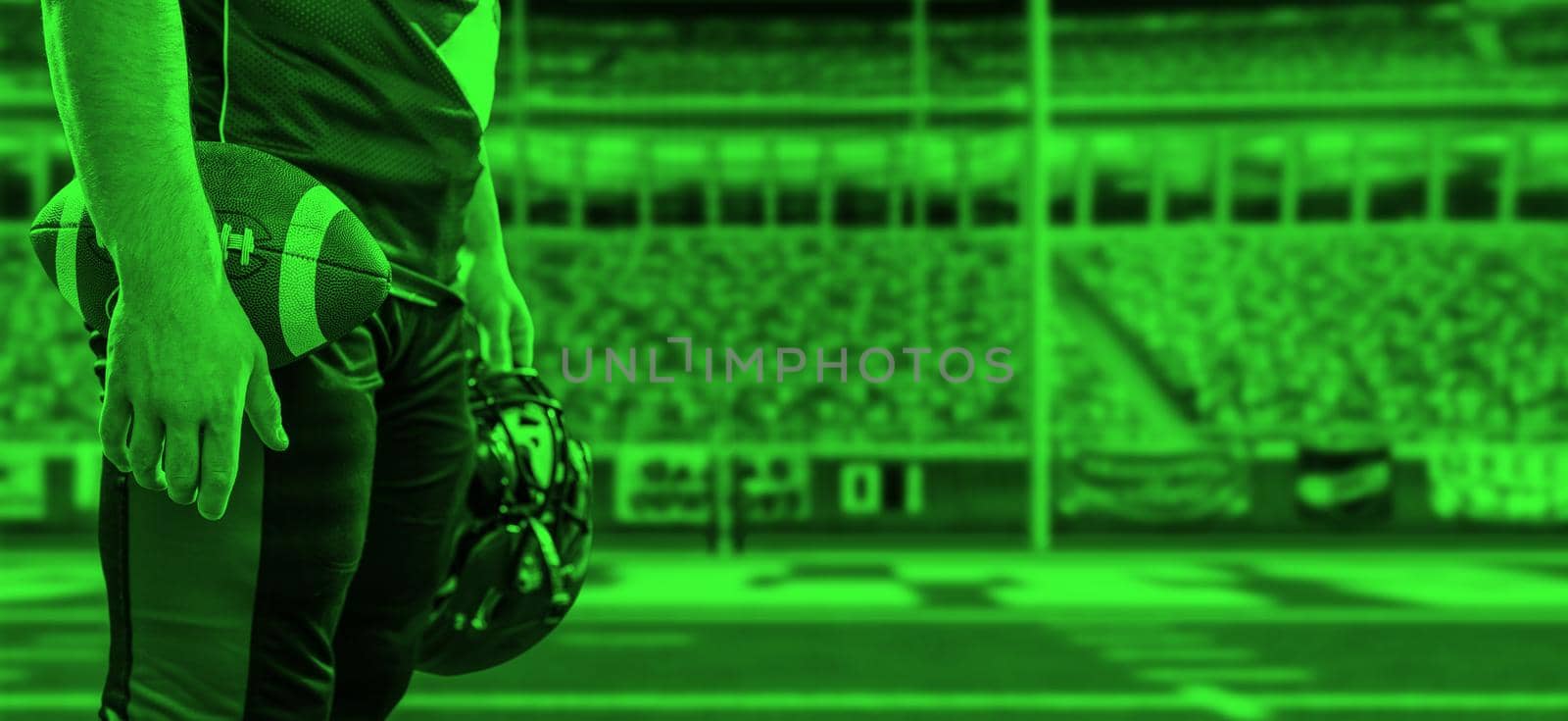 duo toned american football player in  arena at night with stadium lights