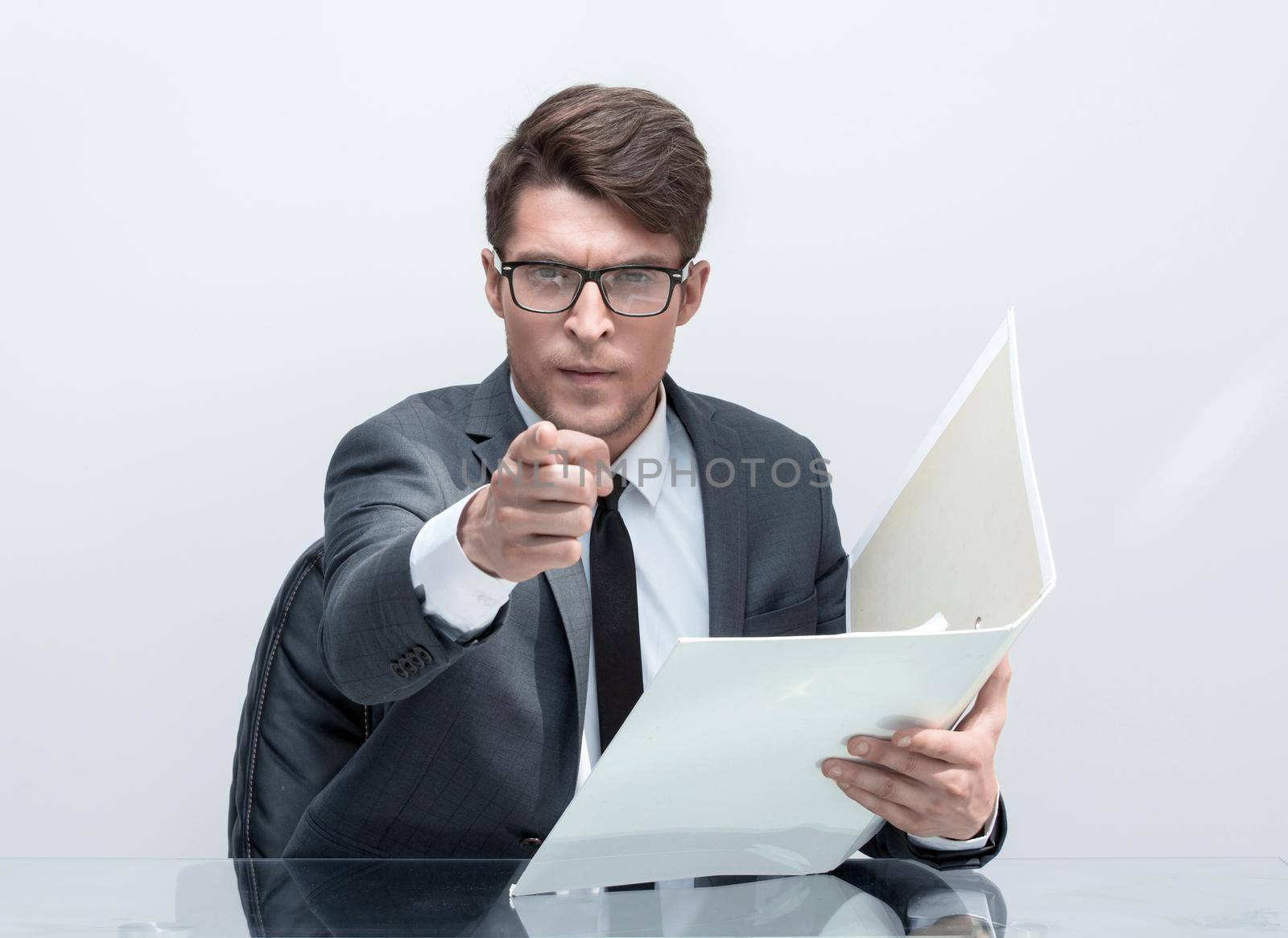 close up. businessman with clipboard pointing at you.business concept