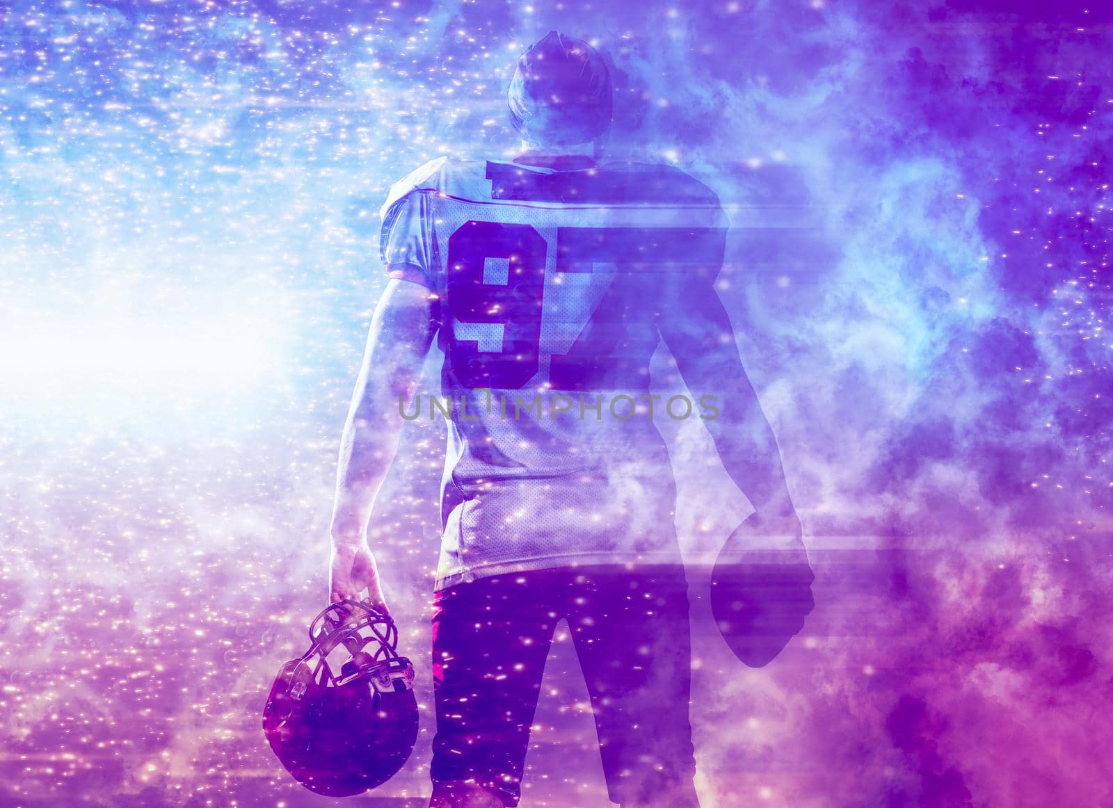 rear view of young confident American football player by dotshock
