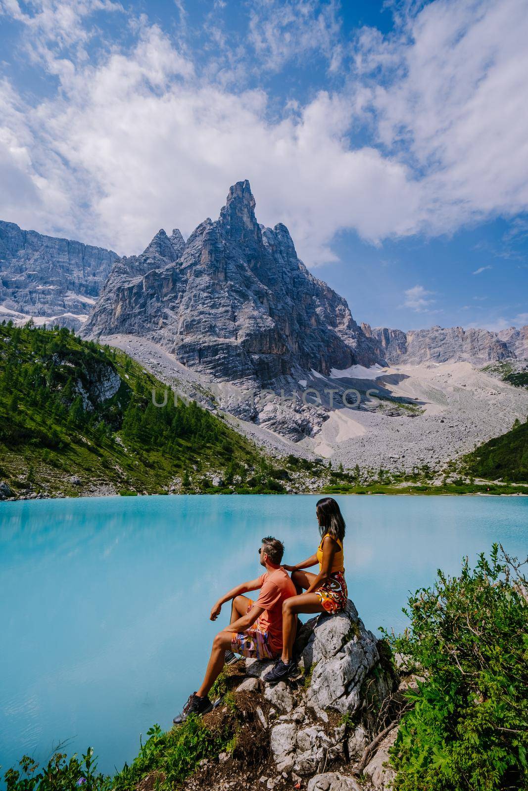 Lake Sorapis Italian Dolomites, Morning with clear sky on Lago di Sorapis in italian Dolomites, lake with unique turquoise color water in Belluno province in Nothern Italy by fokkebok