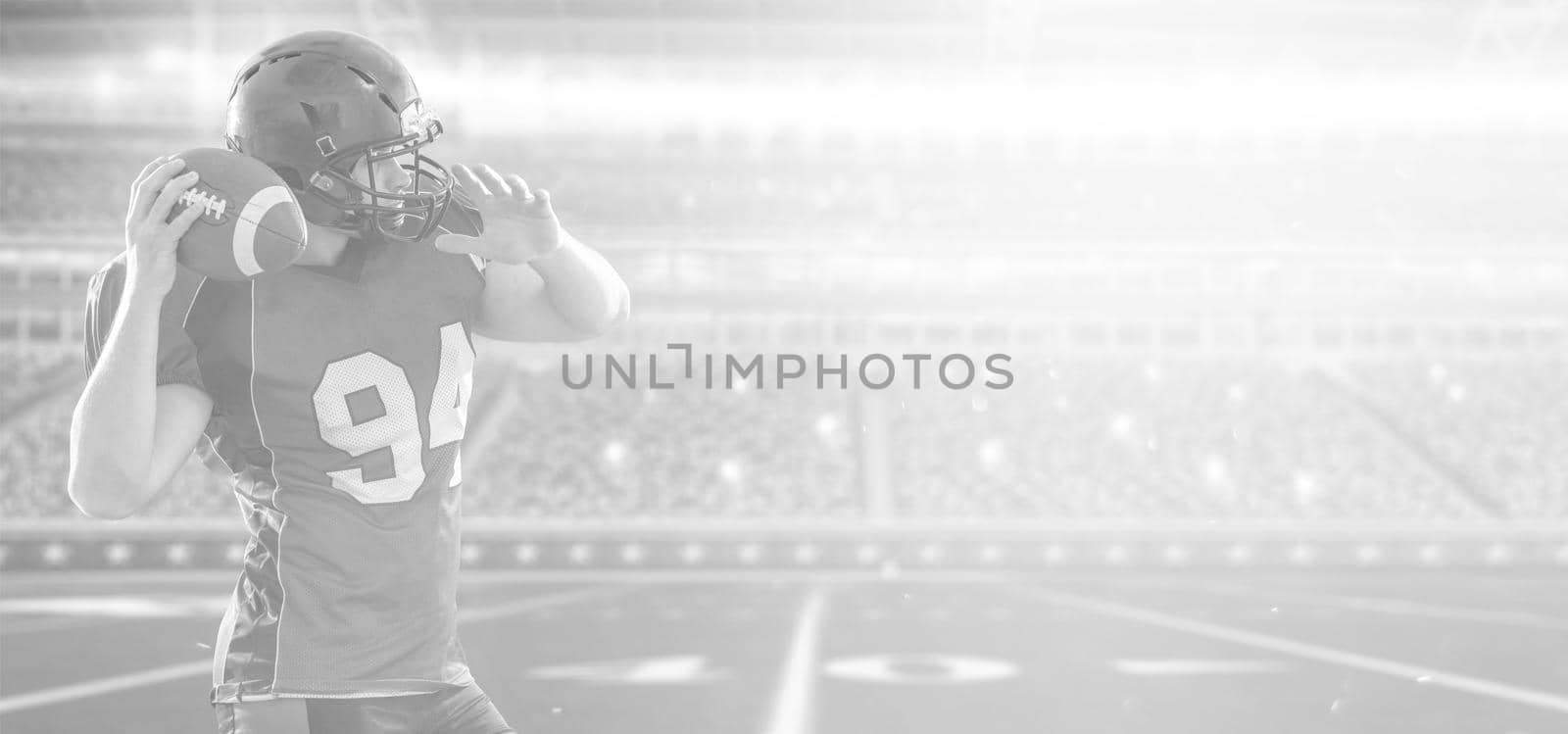 one quarterback american football player throwing ball on big modern stadium with lights and flares