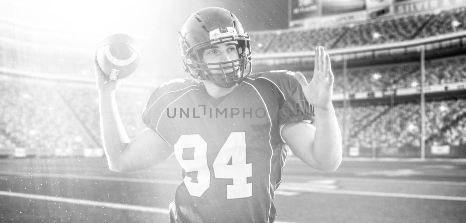 one quarterback american football player throwing ball on big modern stadium with lights and flares