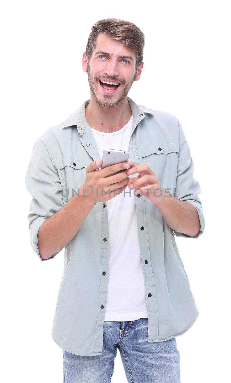 smiling man reading an SMS on the smartphone.isolated on white background