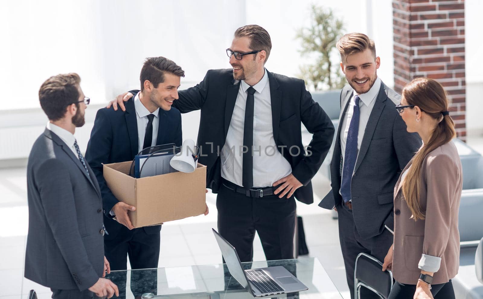 smiling business team meets new employee.photo with copy space