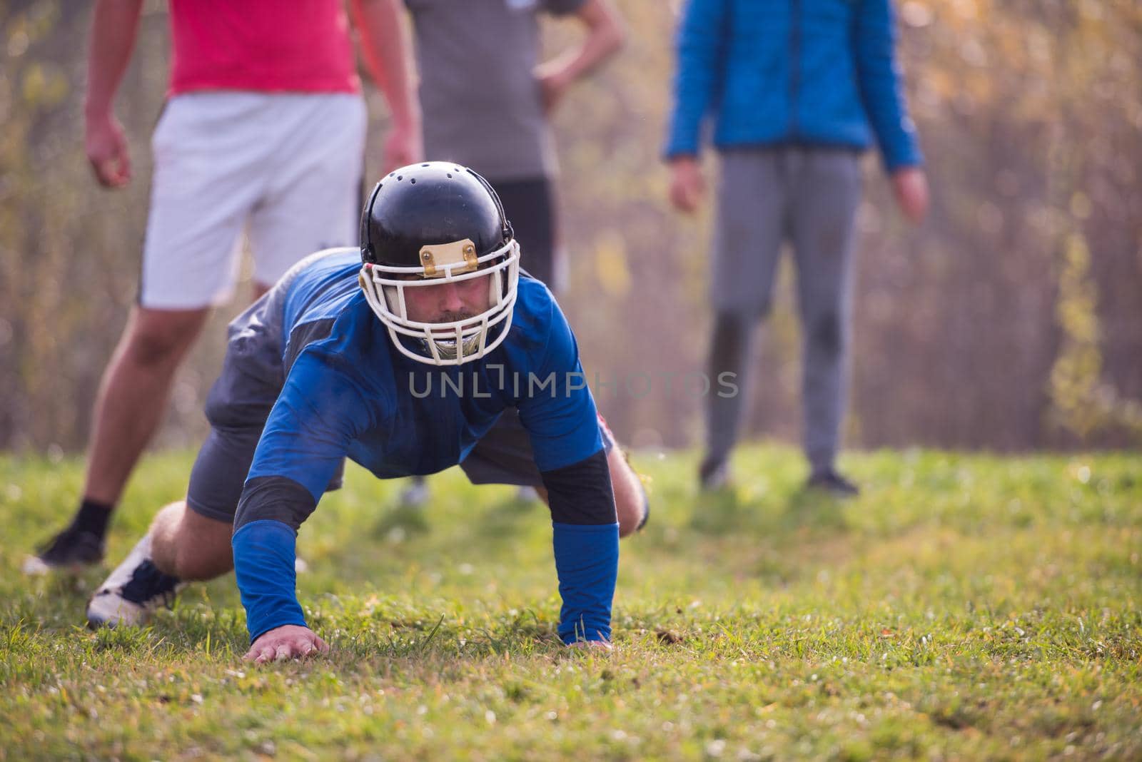 young american football player in action during the training at field