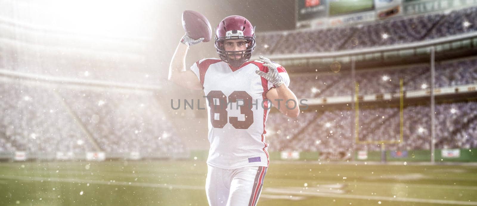 one quarterback american football player throwing ball isolated on gray background