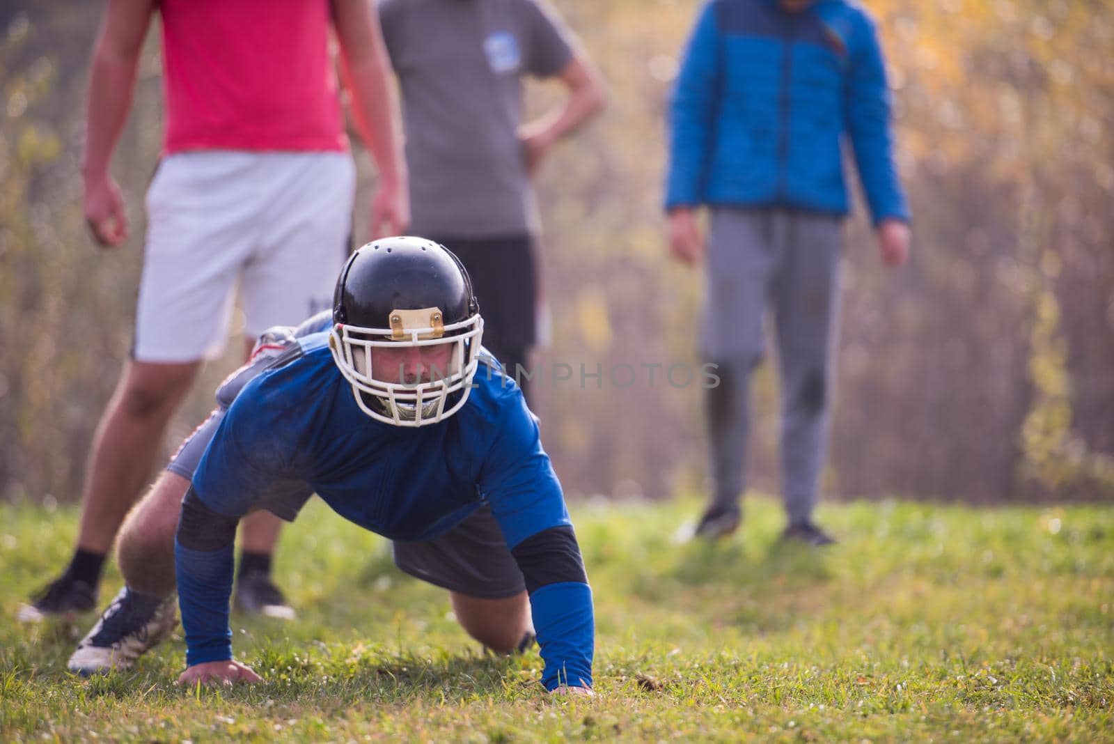 young american football player in action during the training at field